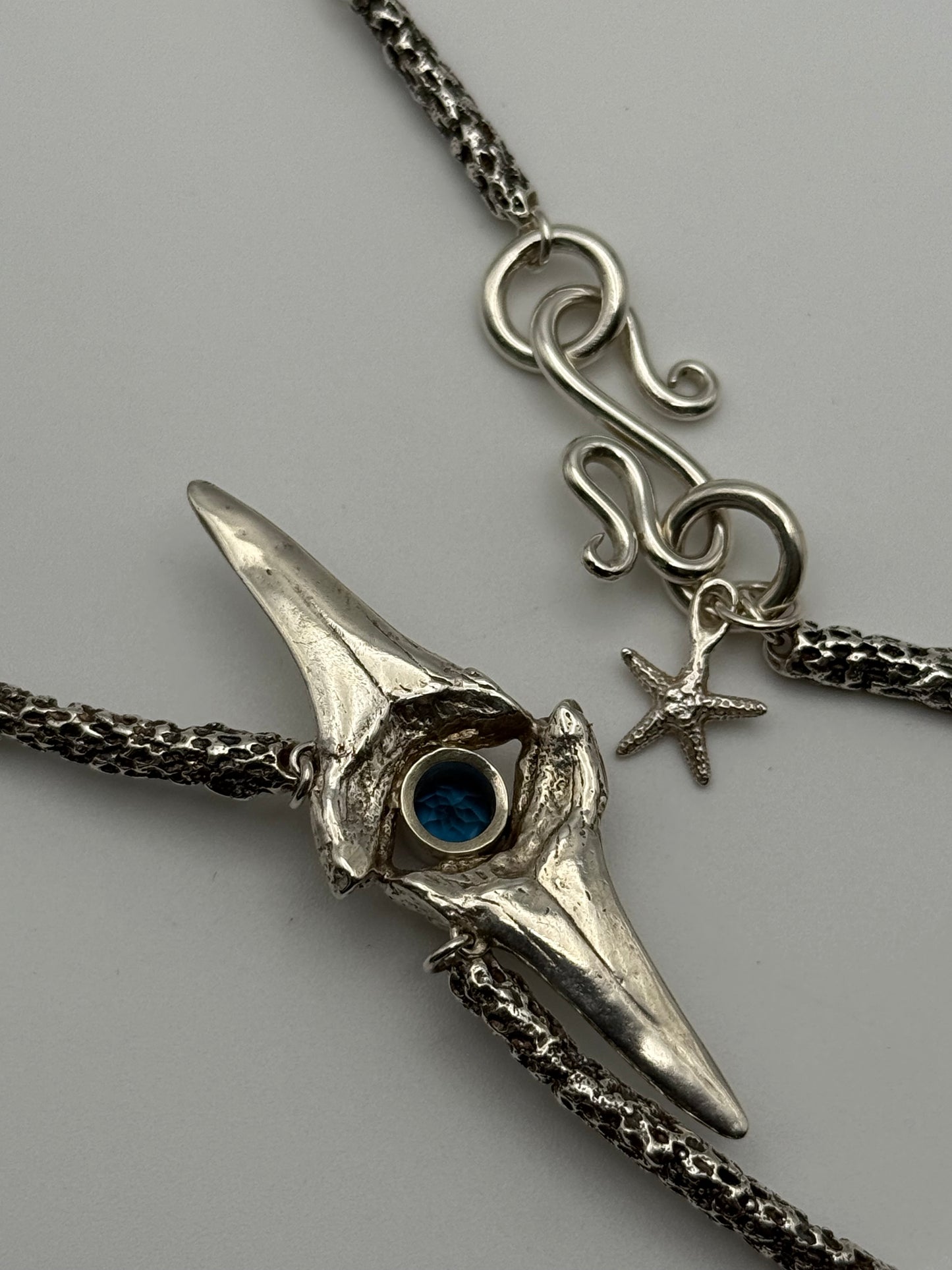 Sterling Silver Shark’s Teeth and Blue Topaz Necklace