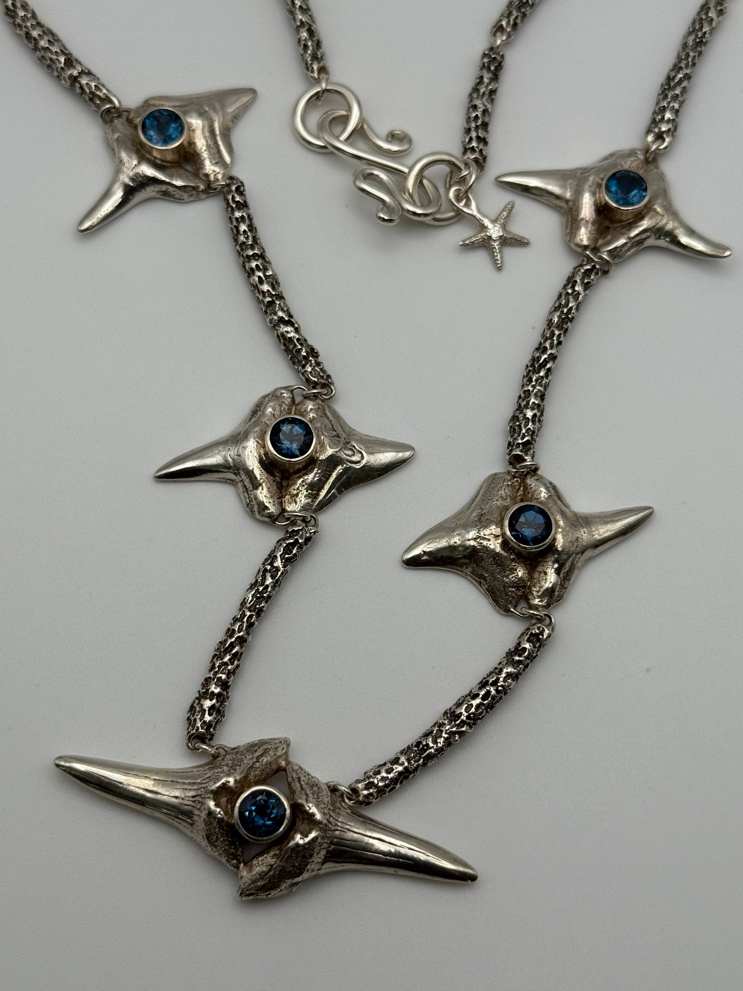 Sterling Silver Shark’s Teeth and Blue Topaz Necklace