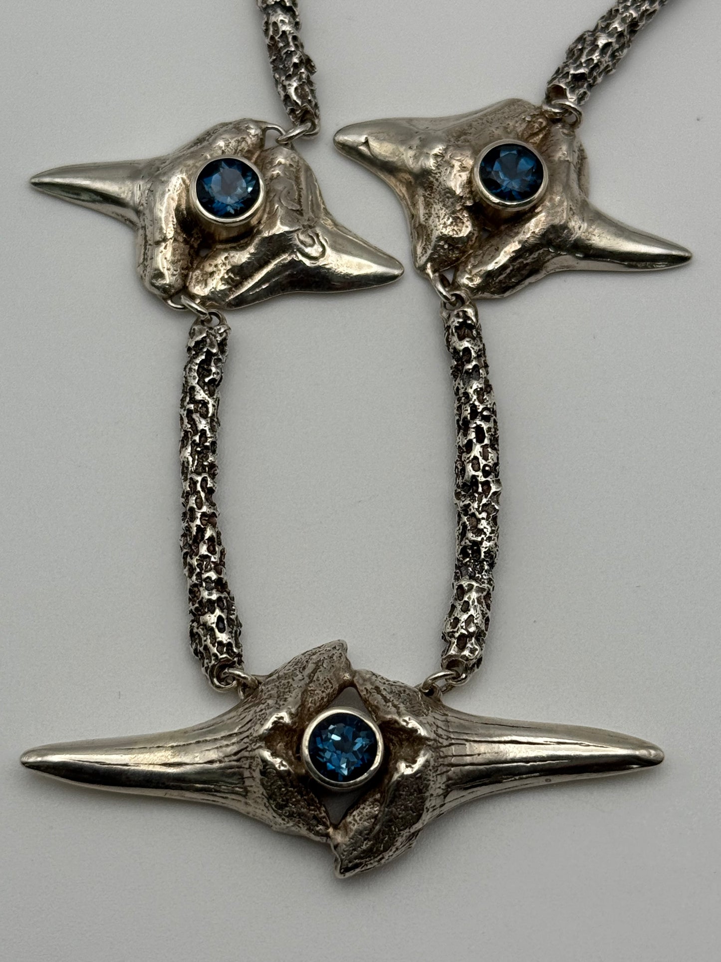 Sterling Silver Shark’s Teeth and Blue Topaz Necklace