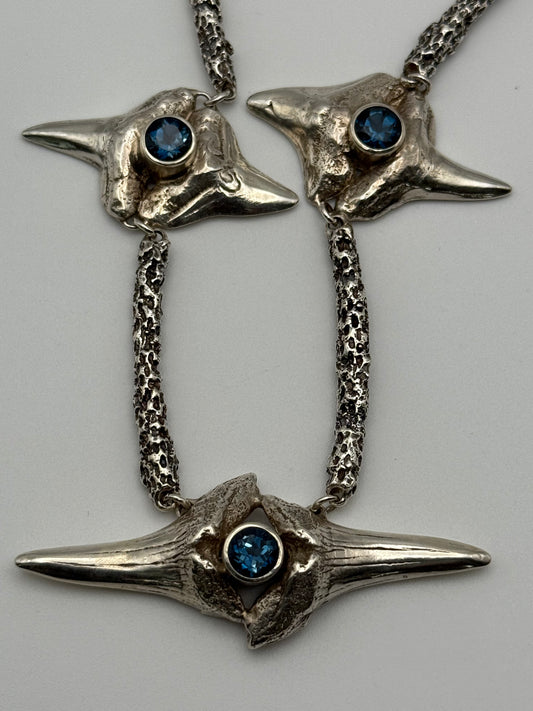 Sterling Silver Shark’s Teeth and Blue Topaz Necklace